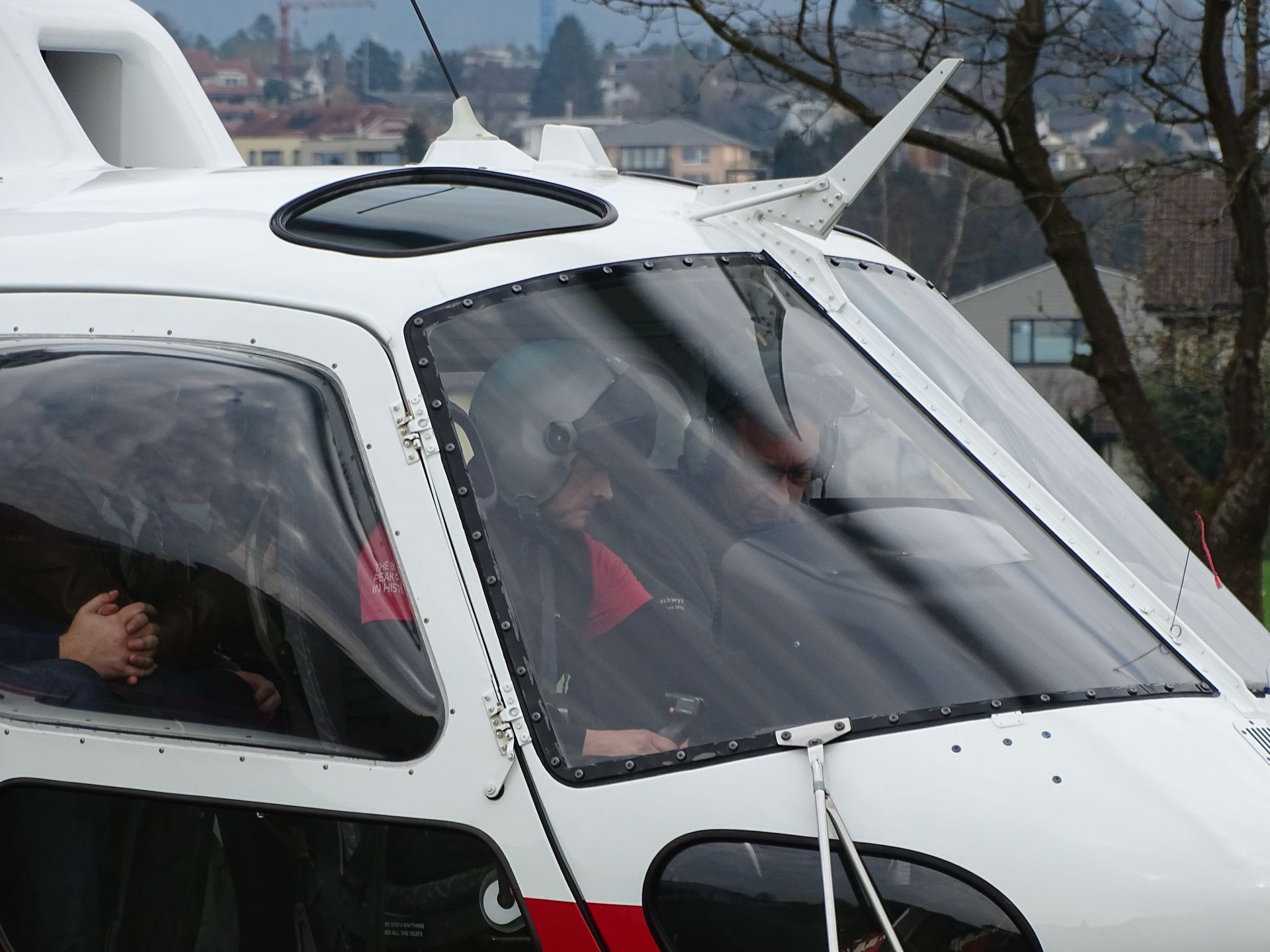 Glückliche Heli Passagiere